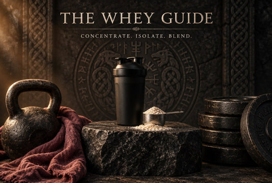 The Whey Guide: a plain shaker, a scoop of protein powder, a kettlebell and weight plates on a granite plinth in front of a carved Norse rune wall